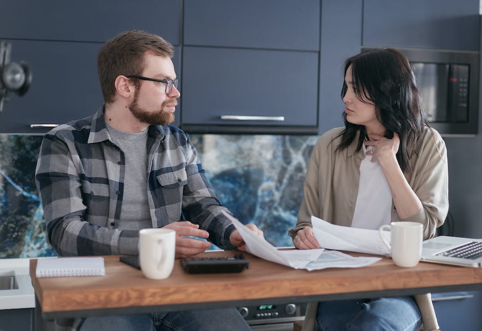 Couple discussing financial goals together
