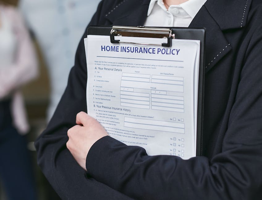 Image showing a person holding an insurance policy, representing life insurance pricing.