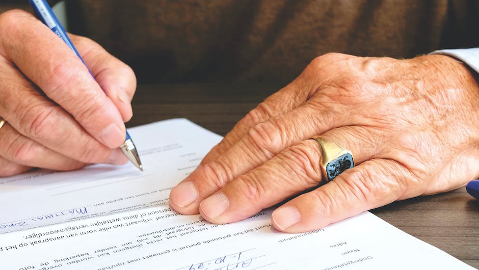 An image showing a person reading a document with the title 'Understanding the Roth IRA' highlighted.