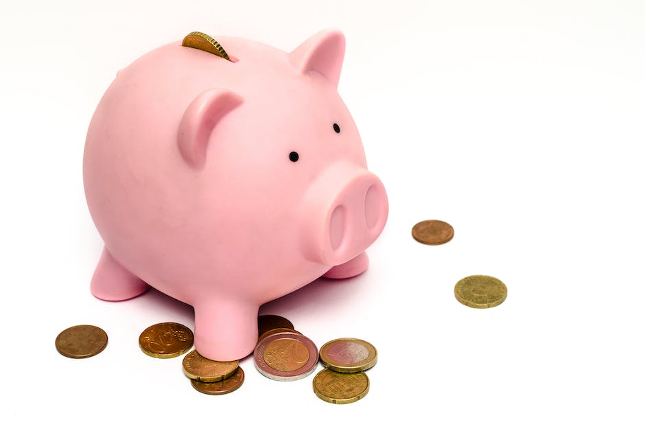 Image depicting a person happily depositing money into a savings piggy bank
